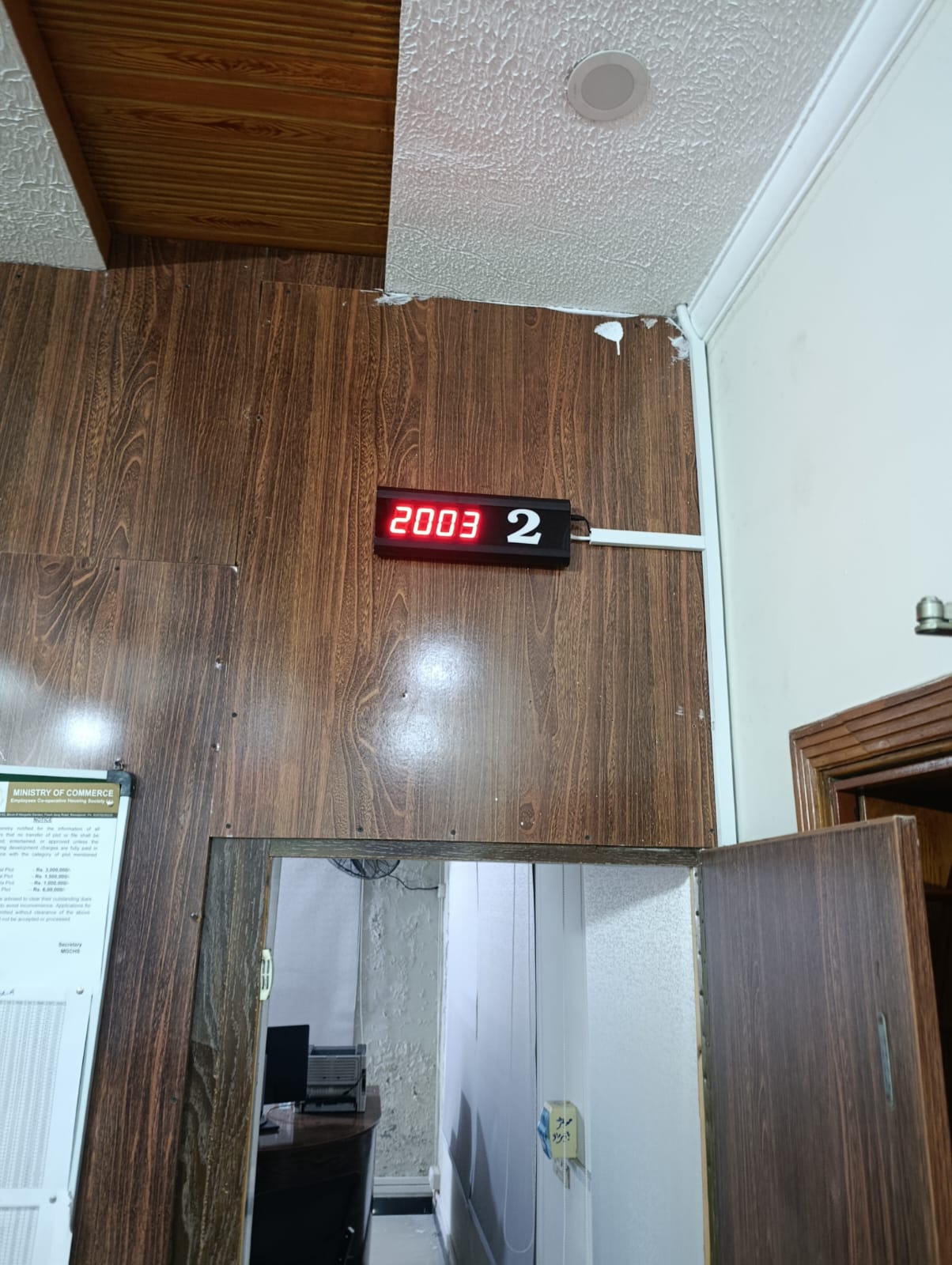 IP-based 4-digit LED counter display showing token 2003 at Counter 2 — Ministry of Commerce